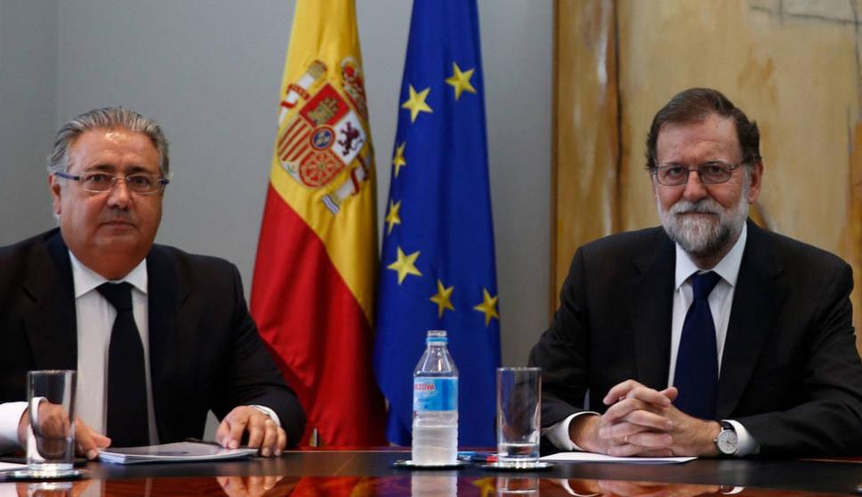 El presidente del Gobierno, Mariano Rajoy y el ministro del Interior, Juan Ignacio Zoido