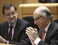 Rajoy junto con Montoro
