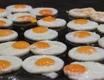 Fotografía de huevos fritos.