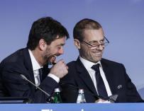 Andrea Agnelli, presidente de la Juve, y Alex Ceferini, de la Uefa.