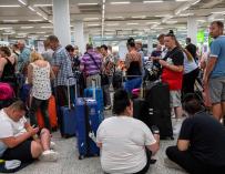 Fotografía de pasajeros afectados en España por la quiebra de Thomas Cook.