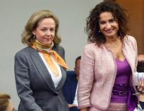 Nadia Calviño y María Jesús Montero. La seriedad y la sonrisa del actual régimen económico